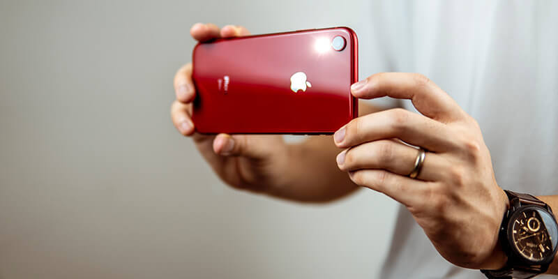 4K video_smartphone Filming 4K video on a red iPhone
