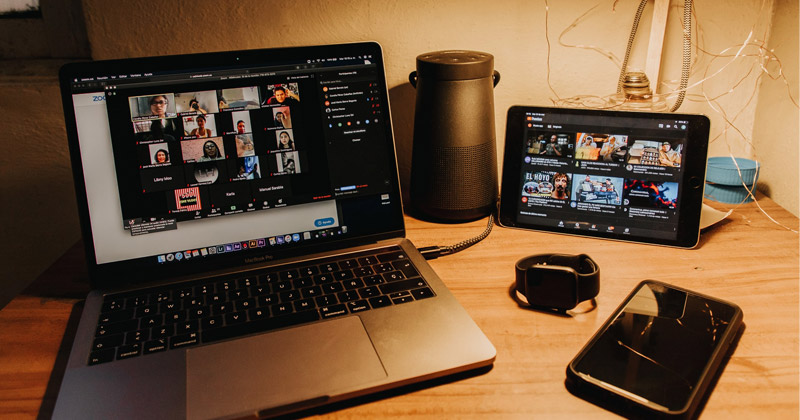 MASV-Portals-Global-Conference-Move-Thousands-Video-Virtual-conference Laptop on a desk with a virtual meeting on screen